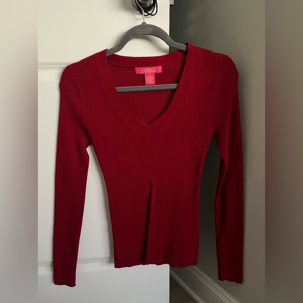 Red V-neck sweater